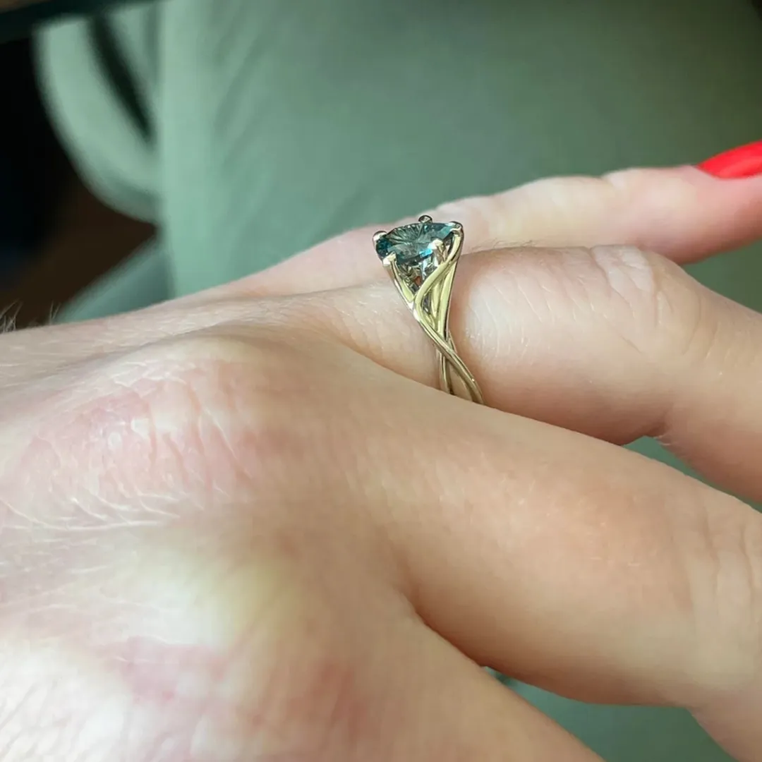 /public/photos/live/Petite Twist Pear Cut Green Moissanite Ring 483 (2).webp